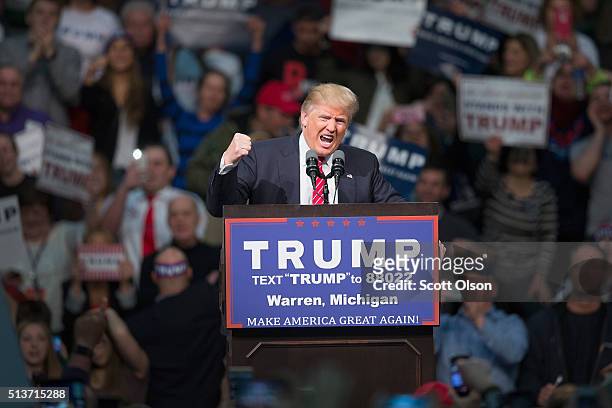 Republican presidential candidate Donald Trump speaks to guests during a rally at Macomb Community College on March 4, 2016 in Warren, Michigan....