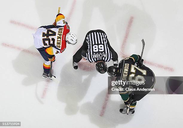 Linseman Dustin McCrank gives Kole Sherwood of the London Knights some instructions prior to his faceoff against Haydn Hopkins of the Erie Otters in...