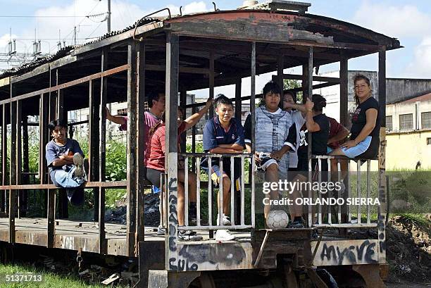 Members of the female soccer team "Estrellas de la Linea", which is constituted by prostitutes, pose at an old wagon before a training session in...