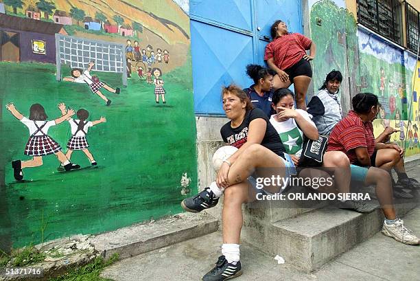 Members of the female soccer team "Estrellas de la Linea", which is constituted by prostitutes, relax before a training session in Guatemala City, 29...