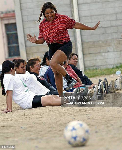 Members of the female soccer team "Estrellas de la Linea", which is constituted by prostitutes, train in Guatemala City, 29 September 2004. The team,...