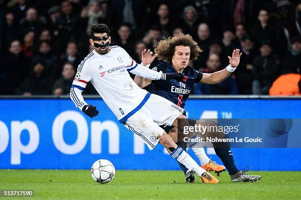 Diego COSTA of Chelsea and David LUIZ of PSG during the UEFA Champions League round of 16 first leg match between Paris Saint-Germain and Chelsea at...
