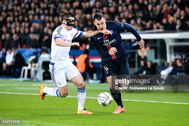 Cesar Azpilicueta of Chelsea and Zlatan Ibrahimovic of PSG during the UEFA Champions League round of 16 first leg match between Paris Saint-Germain...