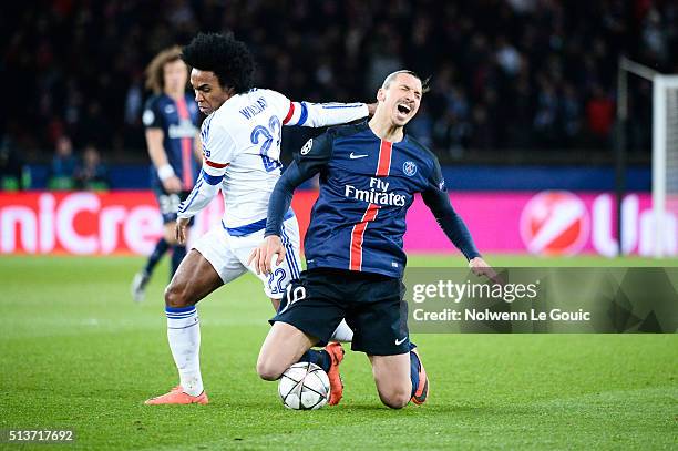 Willian of Chelsea and Zlatan Ibrahimovic of PSG during the UEFA Champions League round of 16 first leg match between Paris Saint-Germain and Chelsea...