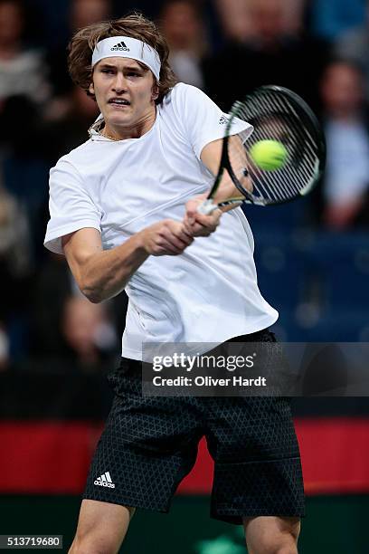 Alexander Zverev of Germany plays a backhand in his match against Tomas Berdych of Czech Republic during Day 1 of the Davis Cup World Group first...