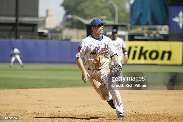 David Wright of the New York Mets fields at third base during the game against the Florida Marlins at Shea Stadium on September 2, 2004 in Flushing,...