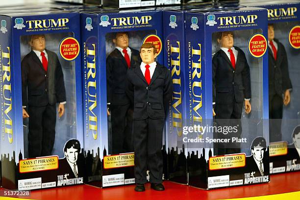 The new Donald Trump 12-inch talking doll September 29, 2004 at the Toys "R" Us store in New York City. The doll's phrases, which were recorded by...