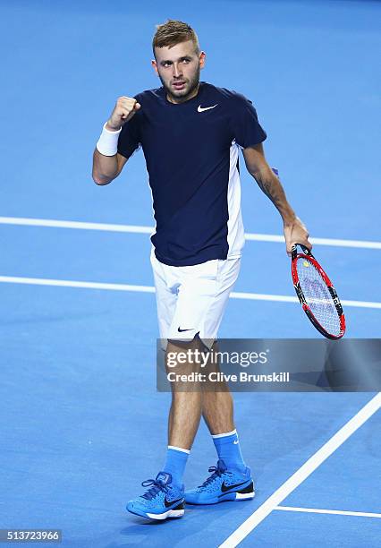 Daniel Evans of Great Britain celebrates a point in his singles match against Kei Nishikori of Japan during day one of the Davis Cup World Group...