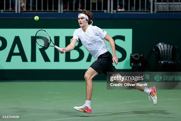 Alexander Zverev of Germany plays a forehand in his match against Tomas Berdych of Czech Republic during Day 1 of the Davis Cup World Group first...