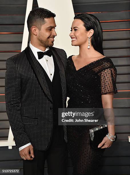 Actor Wilmer Valderrama and singer Demi Lovato arrives at the 2016 Vanity Fair Oscar Party Hosted By Graydon Carter at Wallis Annenberg Center for...