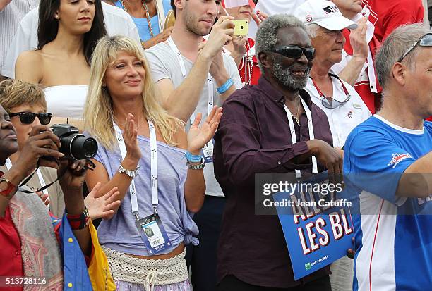 Isabelle Camus, wife of Yannick Noah and his father, Zacharie Noah attend day 1 of the Davis Cup World Group first round tie between France and...