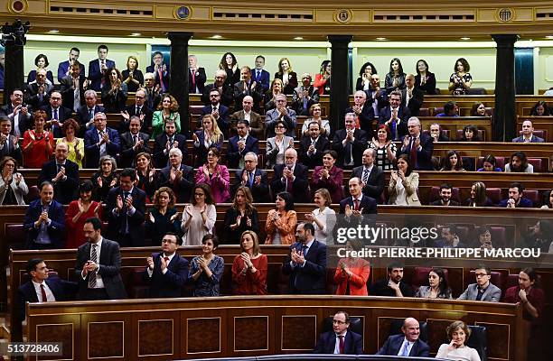 Socialist members of parliament applaud leader of the Spanish Socialst Party and candidate for Prime Minister, Pedro Sanchez at Las Cortes in Madrid,...