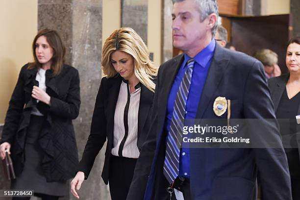 Sportscaster and television personality Erin Andrews, second from left, leaves the courtroom on March 4, 2016 in Nashville, Tennessee.