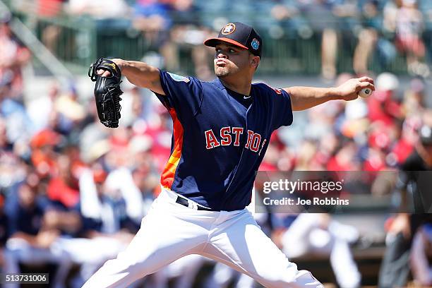 Wandy Rodriguez of the Houston Astros pitches against the St. Louis Cardinals in the second inning of a spring training game at Osceola County...