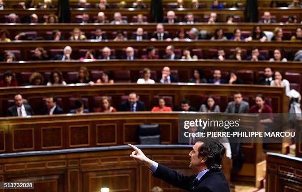 Popular Party spokesman at the Spanish Parliament, Rafael Hernando, speaks to the Parliament's president, at Las Cortes in Madrid, on March 4, 2016...