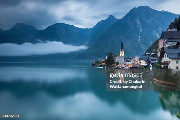 beautiful view of hallstatt in the cloudy evening. - gmunden austria stock pictures, royalty-free photos & images