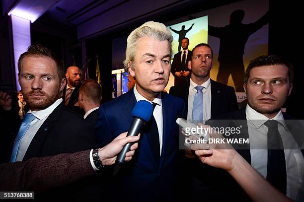 Dutch far-right Freedom Party leader Geert Wilders talks to the press during a party convention of the Flemish far-right party Vlaams Belang,...