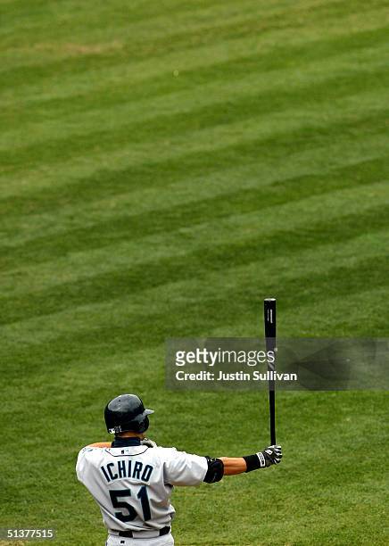 Ichiro Suzuki of the Seattle Mariners prepares to bat against the Oakland Athletics September 30, 2004 at the Network Associates Coliseum in Oakland,...