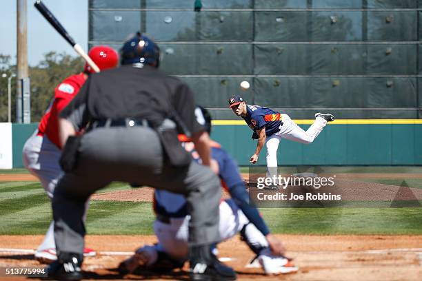 Wandy Rodriguez of the Houston Astros pitches against the St. Louis Cardinals in the first inning of a spring training game at Osceola County Stadium...