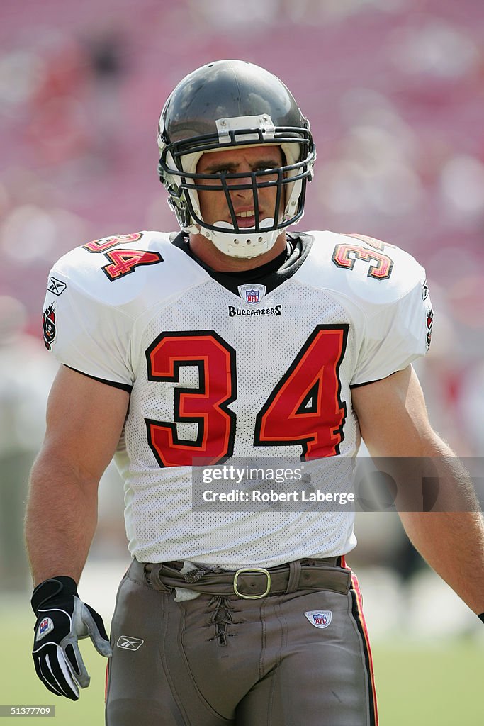 Greg Comella of the Tampa Bay Buccaneers walks on the field during