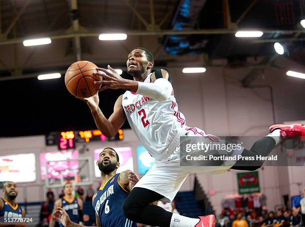 Maine Red Claws vs Iowa Energy. Corey Walden of Maine tries to get off a shot after being fouled by Terry Whisnant of Iowa in the first quarter.