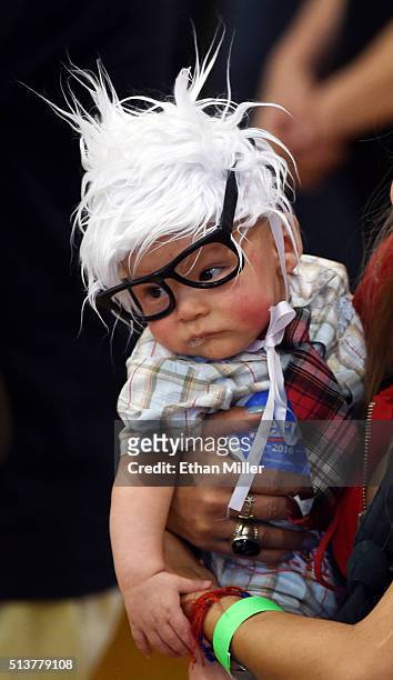 Susan Lomas of Nevada holds her 3-month-old son Oliver Lomas, dressed as Democratic presidential candidate Sen. Bernie Sanders during his campaign...