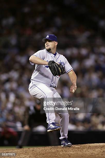 Pitcher Scott Stewart of the Los Angeles Dodgers winds up for the pitch during the game with the San Diego Padres on September 21, 2004 at Petco Park...