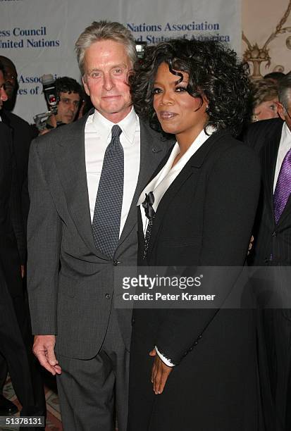Actor Michael Douglas and International Philanthropist Oprah Winfrey make an appearance at The Waldorf Astoria where she was honored by the United...