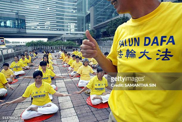 About 40 FaLun Gong members take part in a silent protest calling to bring the former leader of the Republic of China, Jiang Zemin, to justice...