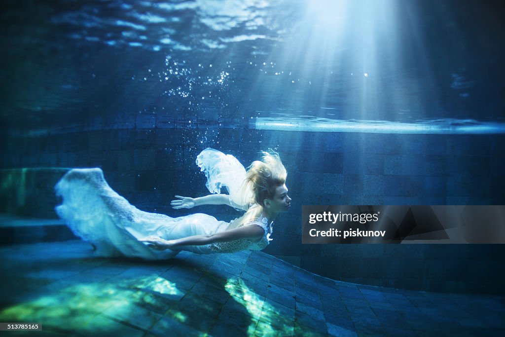 Young woman underwater