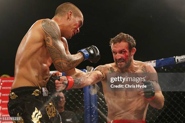 Nick Rundle Nick Rundle punches Rob Ferguson during the Cage Muay Thai 8 bout at ...