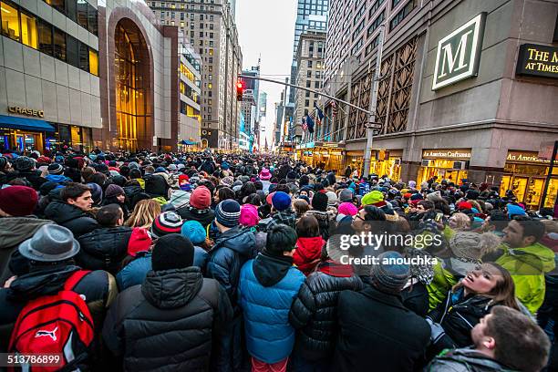 crowds celebrating new year on times square, nyc - new years eve 2014 in times square stock pictures, royalty-free photos & images