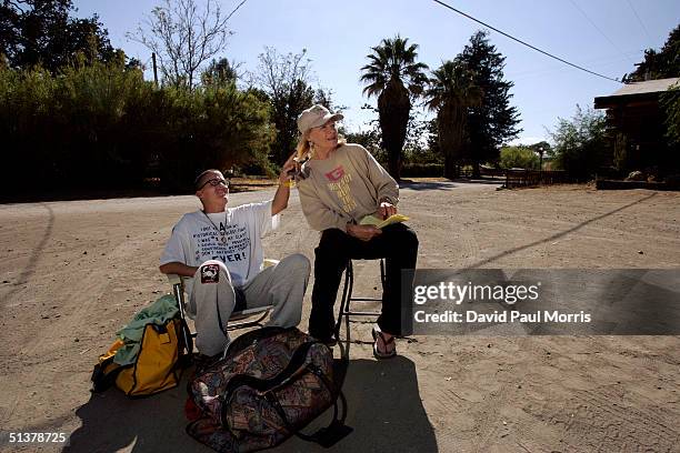 Actress Angie Dickenson and her daughter Nikki Bacharach of Los Angeles sit in the parking lot of the Parkfield Inn hoping to feel aftershocks on...