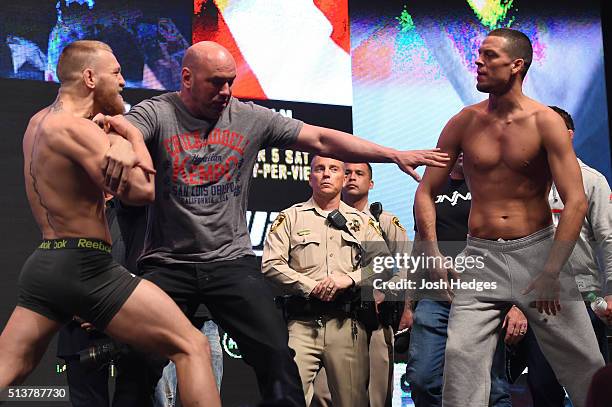 Opponents Conor McGregor of Ireland and Nate Diaz face off during the UFC 196 Weigh-in at the MGM Grand Garden Arena on March 4, 2016 in Las Vegas,...