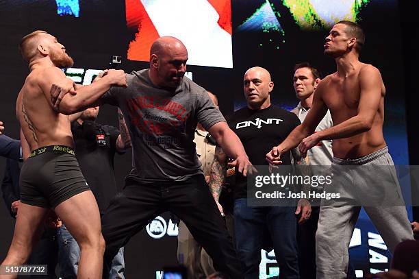 Opponents Conor McGregor of Ireland and Nate Diaz face off during the UFC 196 Weigh-in at the MGM Grand Garden Arena on March 4, 2016 in Las Vegas,...