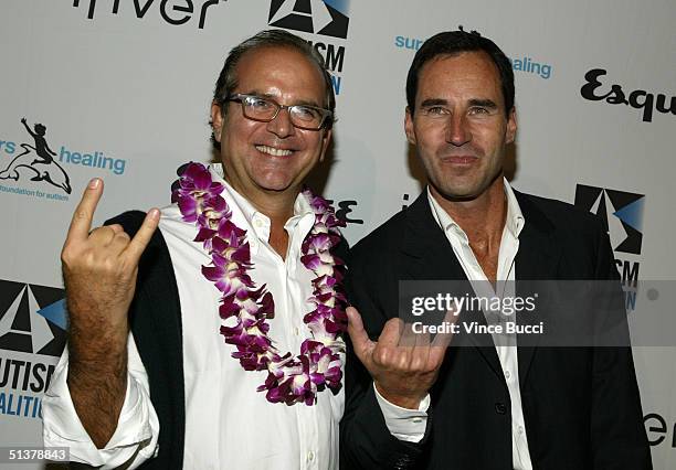 Esquire magazine editor Stephen Jacoby and publisher Kevin O'Malley pose at the Esquire House Los Angeles' Endless Summer Party benefitting the...