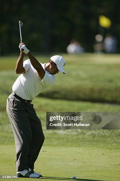 Tiger Woods hits a shot during the second round of the Deutsche Bank Championship at the TPC of Boston on September 5, 2004 in Norton, Massachusetts.