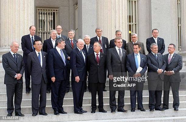 The G7 Finance Ministers pose for a group photo together with the Central Bank governors during the Ministerial Meeting 01 October 2004 on the steps...