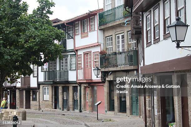 houses in the historic center of guimarães - guimarães stock pictures, royalty-free photos & images