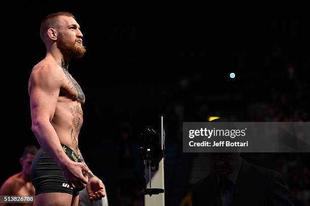 Conor McGregor of Ireland steps on the scale during the UFC 196 weigh-in at the MGM Grand Garden Arena on March 4, 2016 in Las Vegas, Nevada.