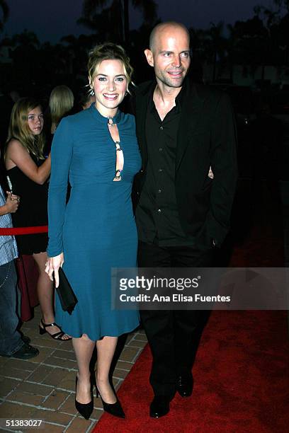 Actress Kate Winslet and director Marc Forster arrive for the film premiere of "Finding Neverland" on October 1, 2004 at the Lobero Theatre in Santa...
