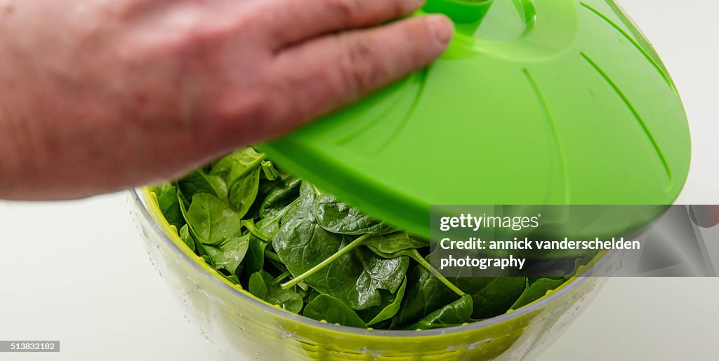 Spinach in salad spinner.