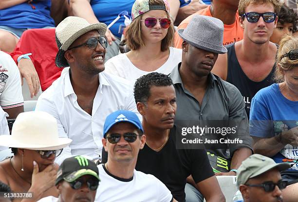 Olivier Dacourt and Sylvain Wiltord who is sleeping attend day 1 of the Davis Cup World Group first round tie between France and Canada at Stade...