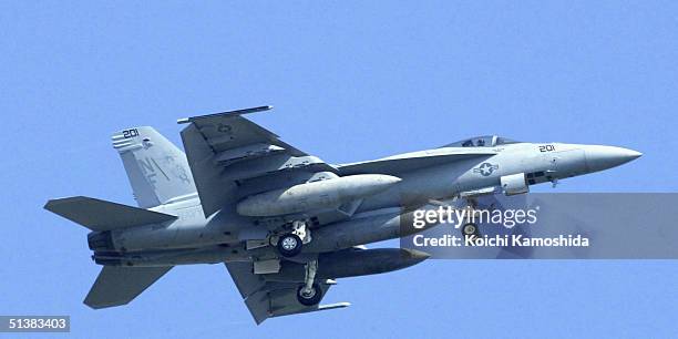 The Royal Maces of Strike Fighter Squadron 27 return home to Atsugi Naval Air Facility on October 2, 2004 in Atsugi, Japan. They completed the...
