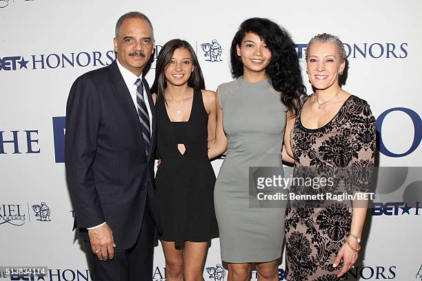 Former Attorney General of the United States, Eric Holder and Sharon Malone pose with family at the BET Honors 2016, Debra Lee's Honoree Reception on...