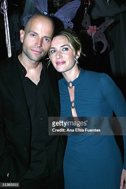 Actress Kate Winslet and director Marc Forster attend the premiere of "Finding Neverland" on October 1, 2004 in Santa Barbara, California.