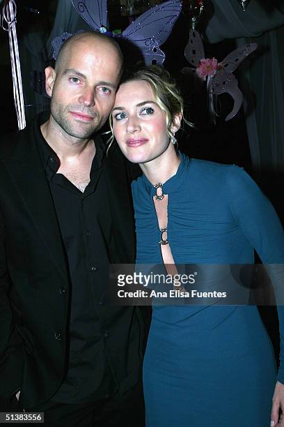 Actress Kate Winslet and director Marc Forster attend the premiere of "Finding Neverland" on October 1, 2004 in Santa Barbara, California.