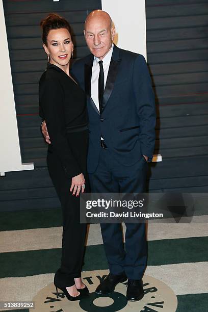 Singer Sunny Ozell and actor Patrick Stewart arrive at the 2016 Vanity Fair Oscar Party Hosted by Graydon Carter at the Wallis Annenberg Center for...