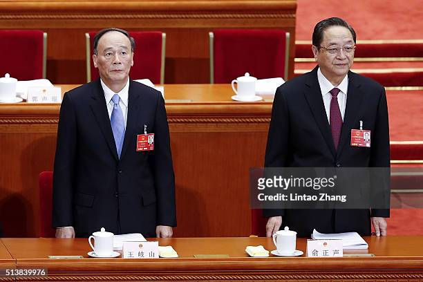 Secretary of the Central Commission for Discipline Inspection Wang Qishan with Yu Zhengsheng, Chairman of the Chinese People's Political Consultative...