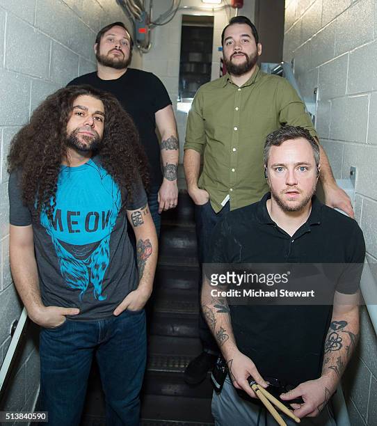 Musicians Claudio Sanchez, Travis Stever, Zach Cooper and Josh Eppard of Coheed & Cambria attend Coheed & Cambria in concert at The Theater at...